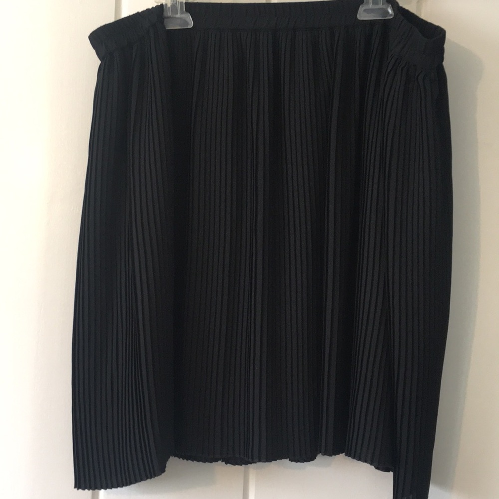 Black accordion style skirt